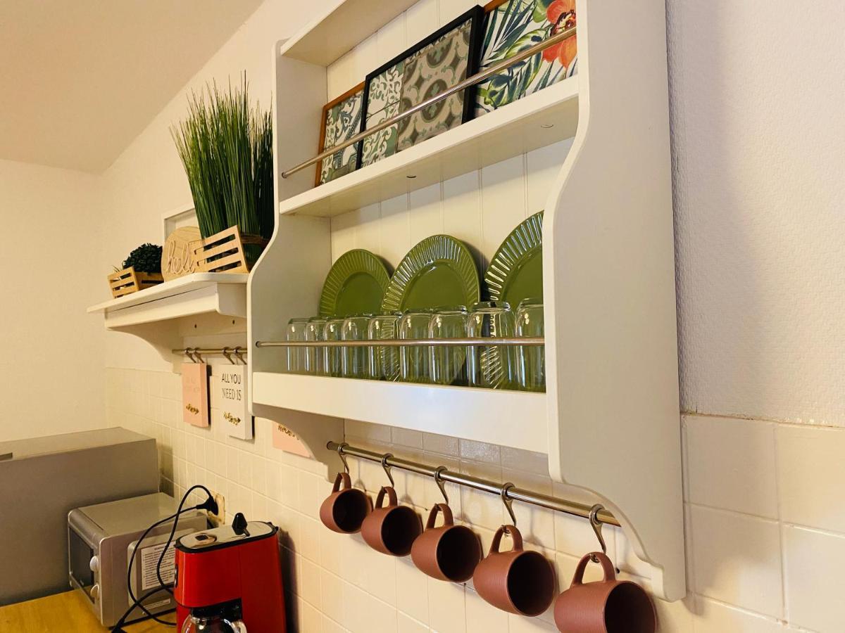 Tm Aparts Dortmund Exterior foto A wall-mounted plate rack